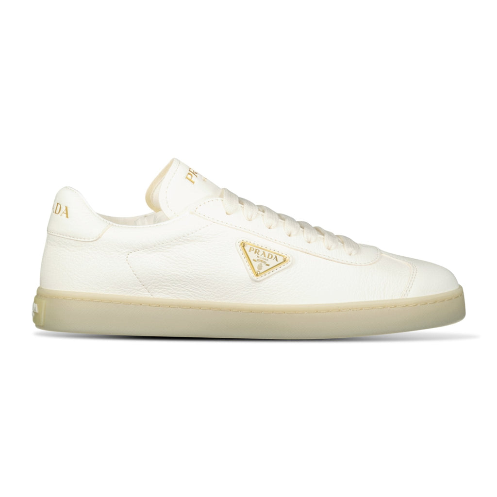 Prada Leather Trainers with Gold Metal Appliqué in Avorio