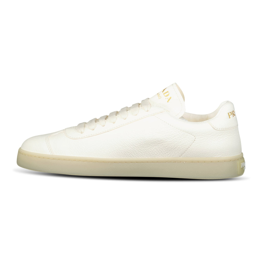 Prada Leather Trainers with Gold Metal Appliqué in Avorio